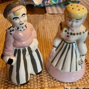 California Cleminson pottery. Pair of powder shakers. 6” tall